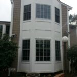 after construction photo showing windows and side of home