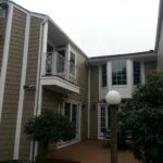 after construction photo of deck and second story balcony, side view