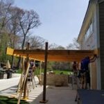 during construction photo showing the side view of the custom deck